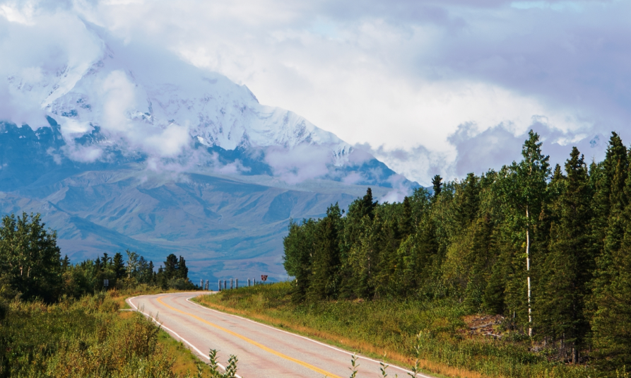 Yukon road towards a mountain